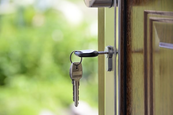 A key in a door to highlight GDPR's new access regulations